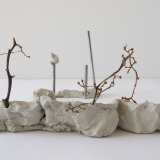 TA Barricade 15x24x9cm Clay metal tubes and dried plant stem 2018